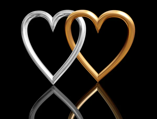 Anéis de coração dourado se cruzando — Fotografia de Stock