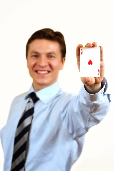 Affärsman som innehar en ace casino kortet, urklippsbana ingår — Stockfoto