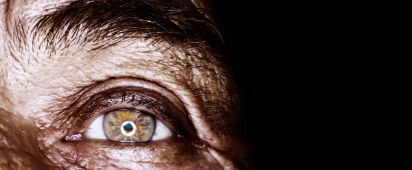 Close up eye of an old man — Stock Photo, Image