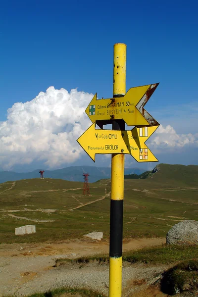 stock image Traffic sign on top of the mountain,nice landscape on the background