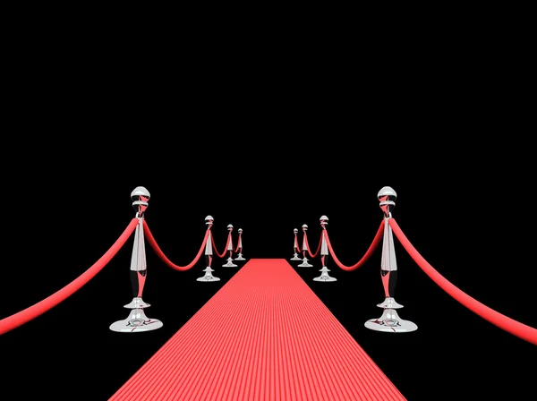 Красная дорожка с хромированными столбами — стоковое фото
