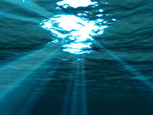 Subaquático, superfície do mar com raio de sol brilhando através — Fotografia de Stock