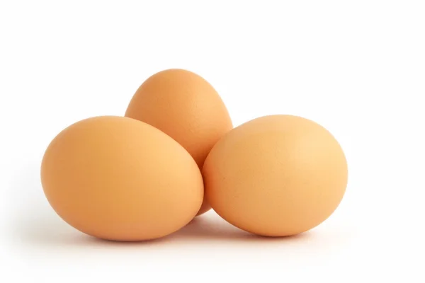Tres huevos marrones —  Fotos de Stock