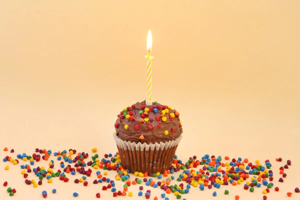 Cupcake com vela — Fotografia de Stock