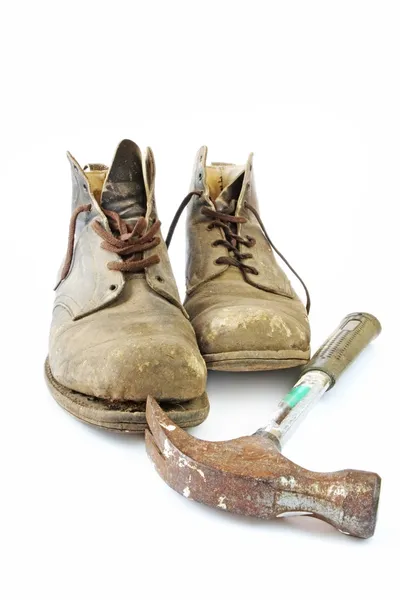 Martelo e botas de trabalho — Fotografia de Stock