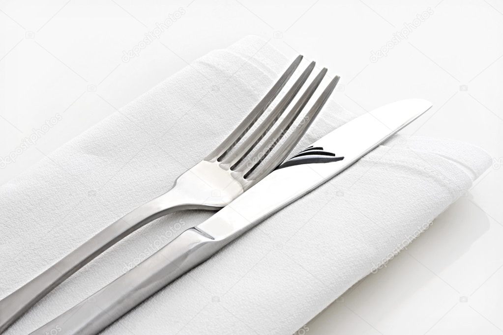 Knife and Fork on White Linen