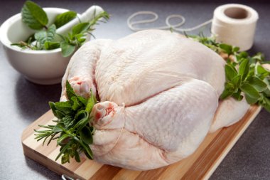 Preparing Chicken for Roasting clipart