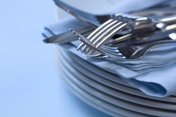 Plate Stack and Cutlery — Stock Photo, Image