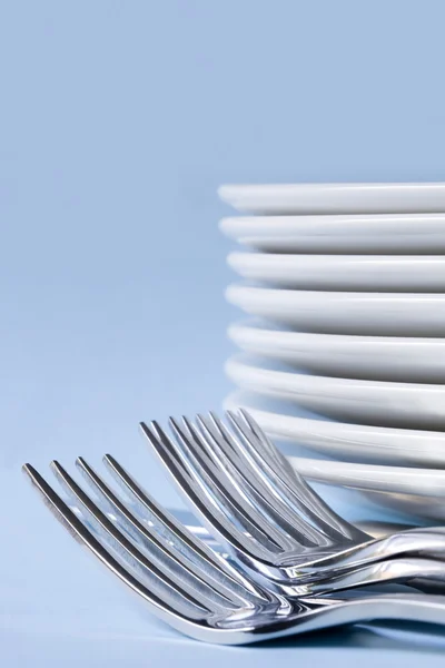 Столове приладдя і тарілки вечеря — стокове фото