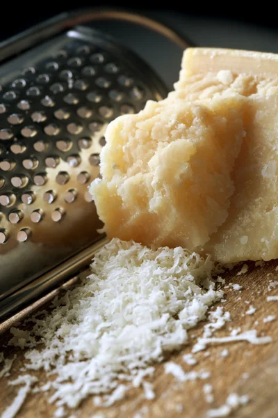 Grating Parmesan Cheese — Stock Photo, Image