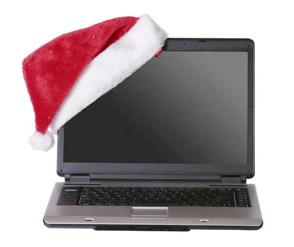 stock image Laptop with Christmas hat