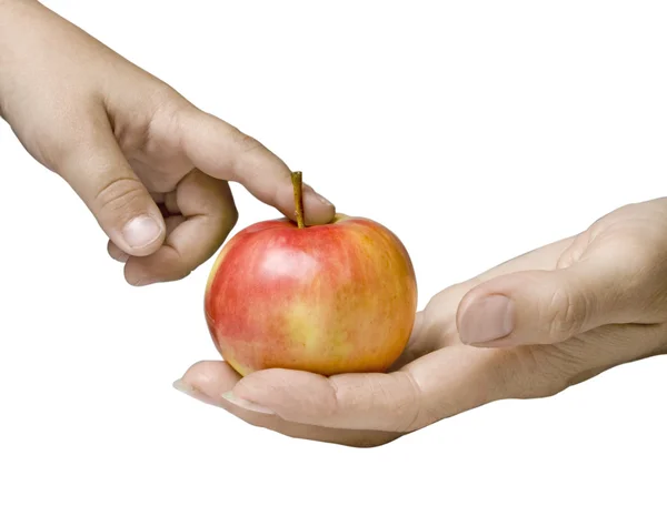 Рука с яблоком — стоковое фото
