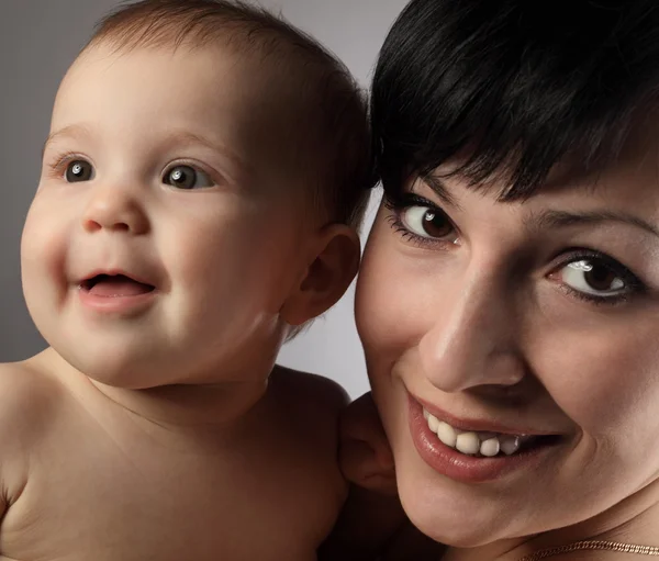 Baby og mor - Stock-foto