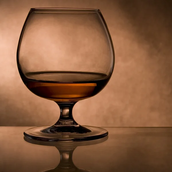 Snifter glass of cognac — Stock Photo, Image