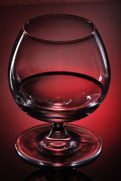 stock image Glass of cognac