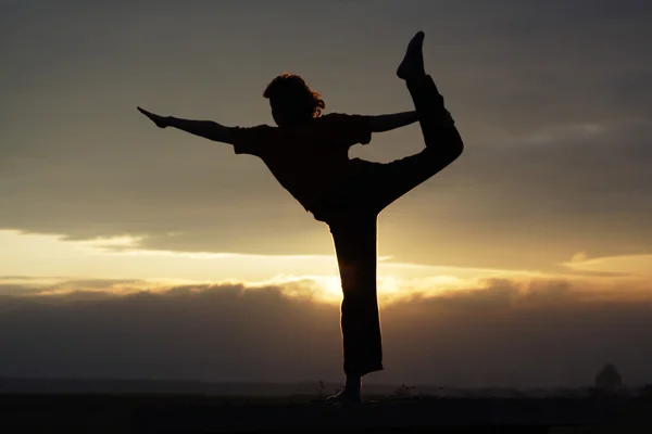 Yoga during sunset — Stock Photo, Image