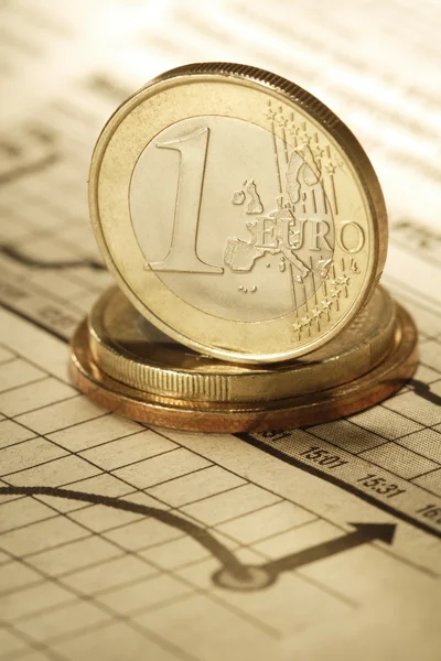 Euro cent on newspaper chart — Stock Photo, Image