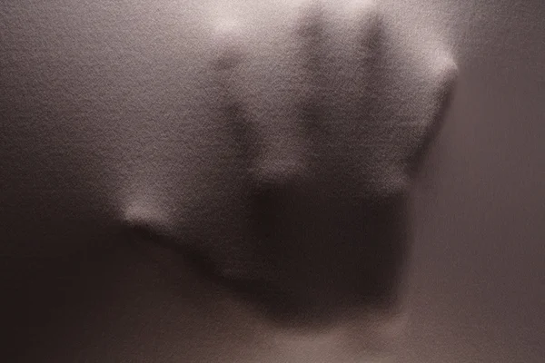 Mão humana sob a superfície — Fotografia de Stock