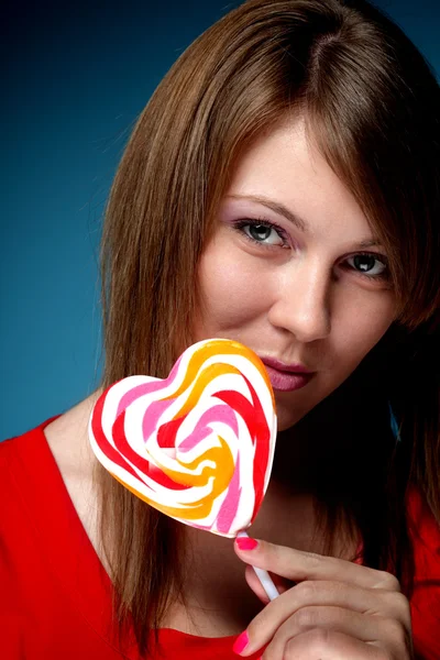 Girl with sweetmeat — Stock Photo, Image