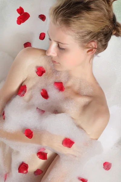 Beauty woman in foam — Stock Photo, Image