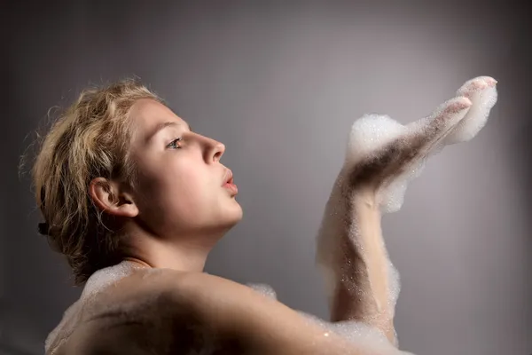 Beauty woman with foam — Stock Photo, Image