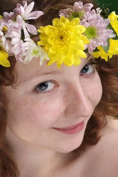 Young woman with flower diadem — Stock Photo, Image