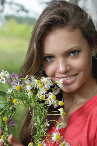 Young woman with flower — Stock Photo, Image