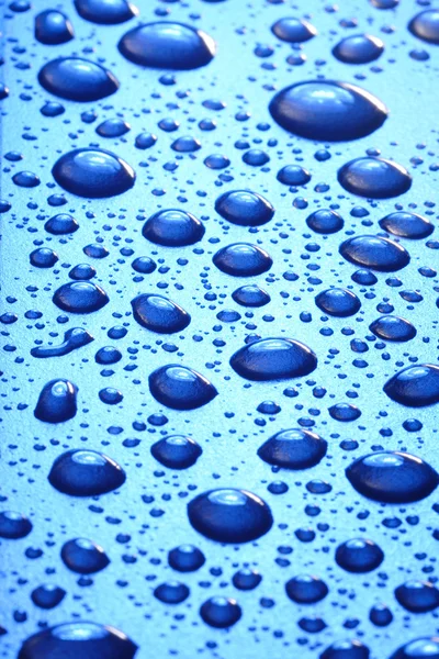 背景为蓝色水滴 — 图库照片