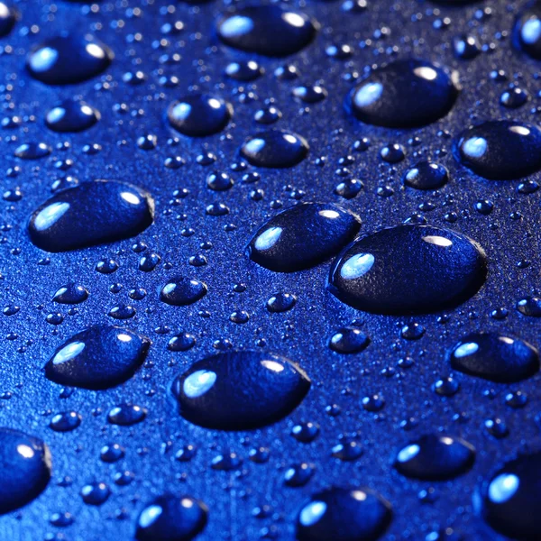 Arkaplan için mavi su damlaları — Stok fotoğraf