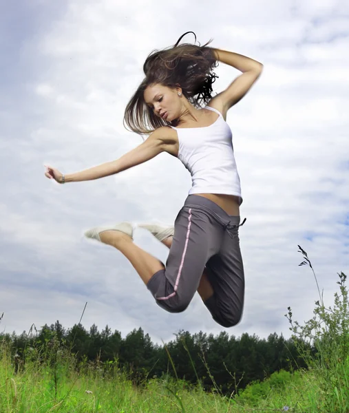 Happy jumping girl — Stock Photo, Image
