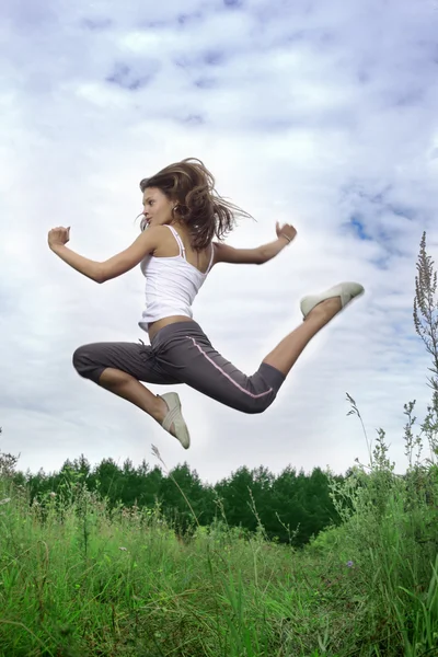 Happy jumping girl — Stock Photo, Image