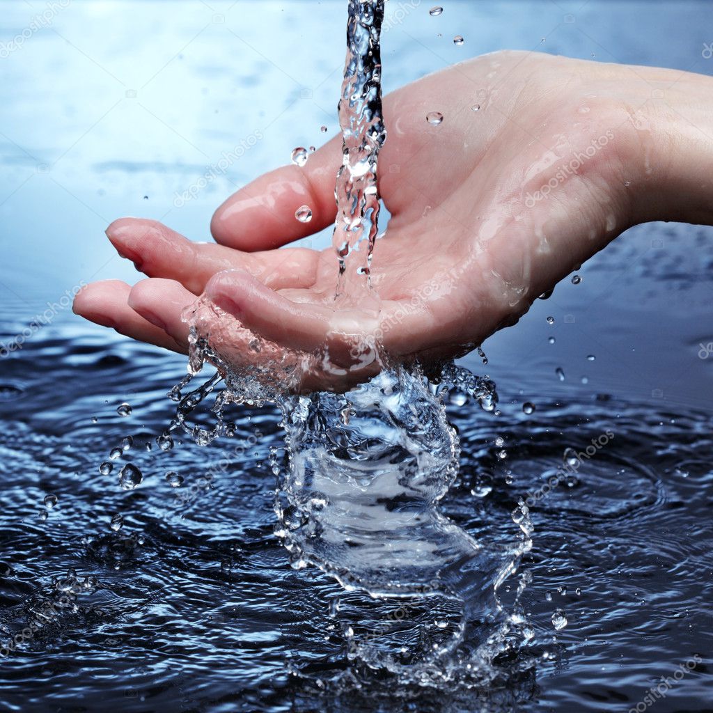 Woman hand in water splash — Stock Photo © chepko #5645203