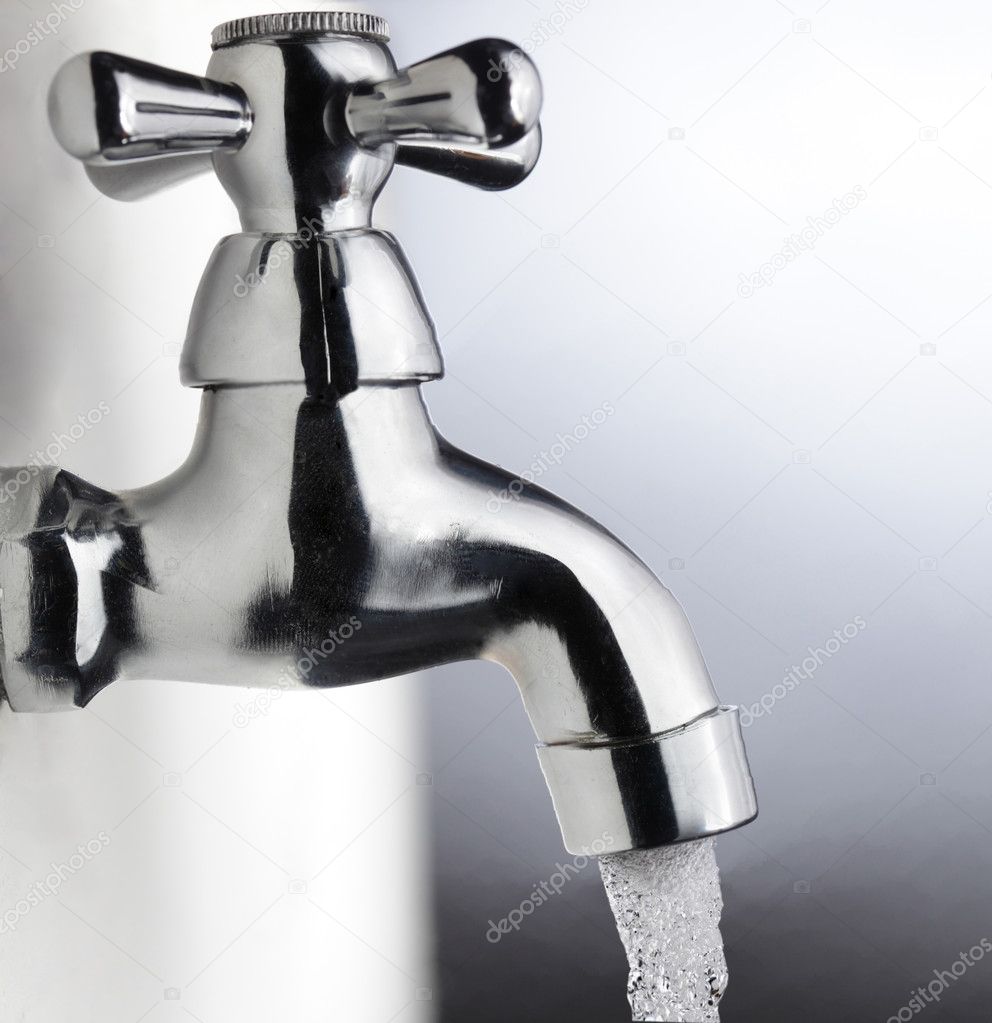 Water drop from metal tap