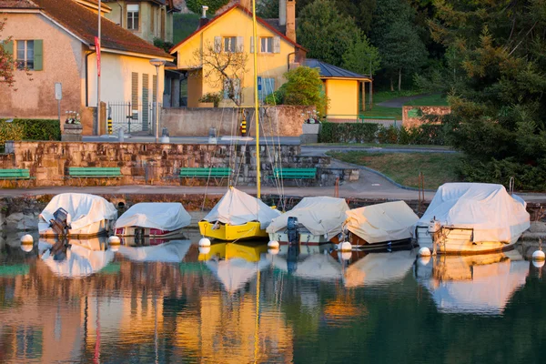 Boats in the early morning sunlight — Stock Photo, Image