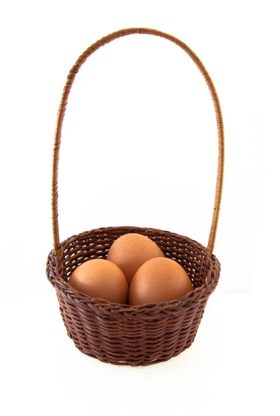 stock image The eggs and the wicker basket