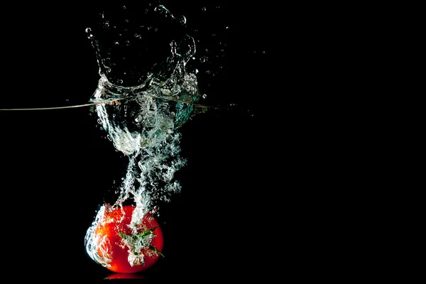 トマトの水のしぶき — ストック写真