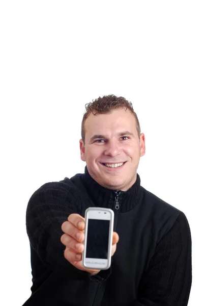 Młody człowiek gospodarstwa telefon komórkowy — Zdjęcie stockowe