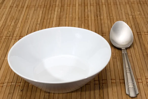 Bowl and spoon — Stock Photo, Image