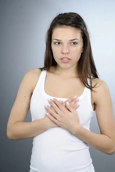 Young woman examining breasts — Stock Photo, Image