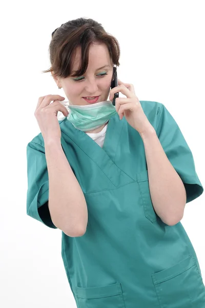 Doctor offering help by cell phone — Stock Photo, Image