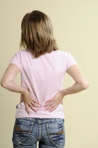 Espalda de mujer sufriendo — Foto de Stock
