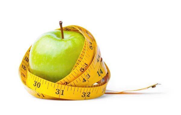 Yeşil elma ve ölçü bandı — Stok fotoğraf