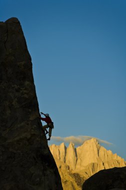 Climber on the edge. clipart