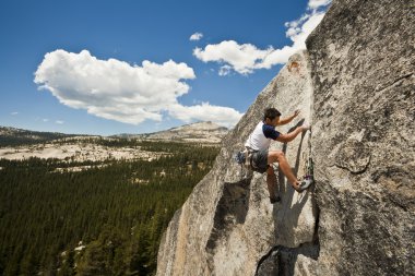 Male rock climber. clipart