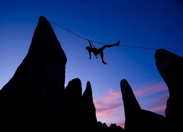 Climber on a tyrolean traverse. — Stock Photo, Image