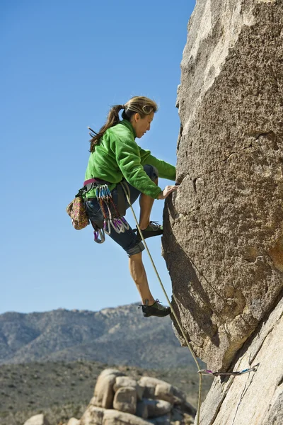Female rock climber. Stock Picture