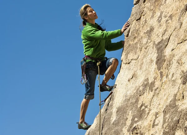 Female rock climber. Stock Image