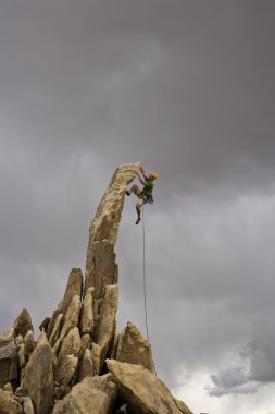 Male rock climber. clipart