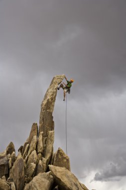 Male rock climber. clipart