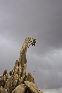 Male rock climber. clipart